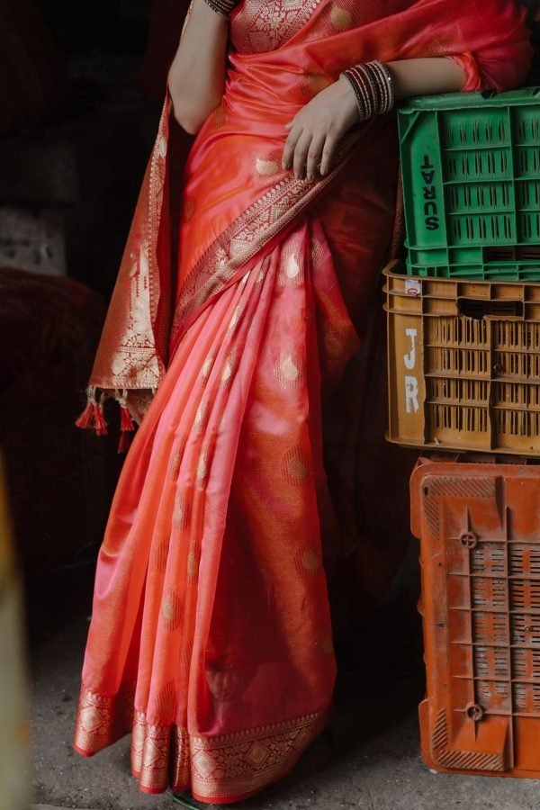 Ira Maheshwari silk saree draped in deep madder red