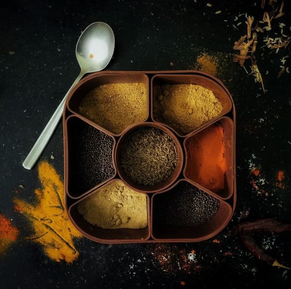 The seven-bowl masala dabba with its fitted lid