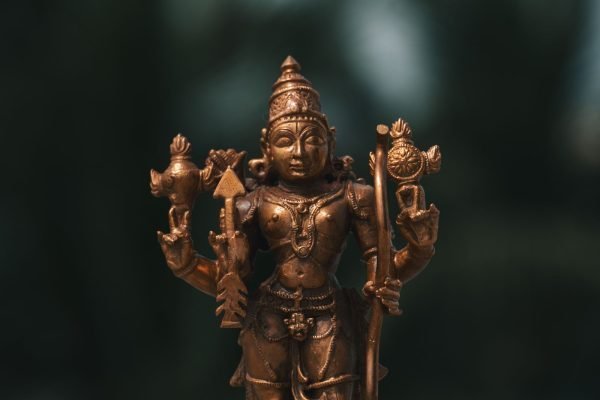 Dokra brass wall accent, a cast tribal figure