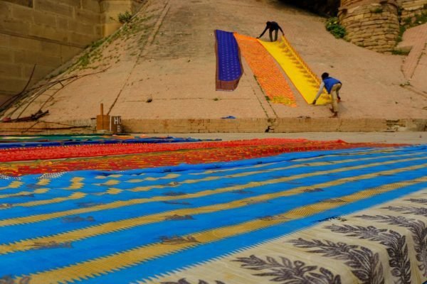 Dyed lengths drying after the vat