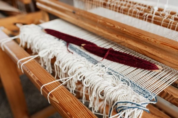 On the loom in the Dhonekhali weaving belt