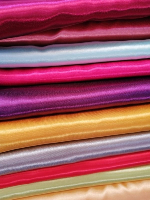 Small-batch dyed silks, no two lengths alike