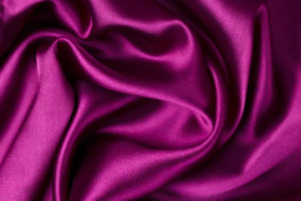 Close detail of the madder-dyed silk body
